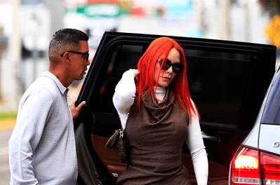 Orden de arresto contra esposa de Daddy Yankee queda sin efecto tras entregar información